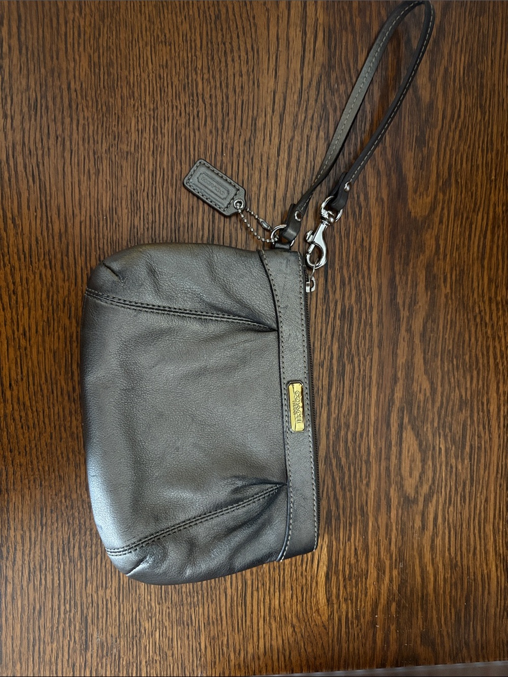 Coach grey/gold Leather Wristlet with Gold Plaque